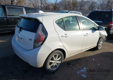 2015 Toyota Prius C One from USA, damaged, VIN JTDKDTB36F1584137